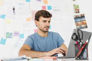 Content writer working on manuscript draft