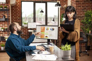 Publishing team discussing book marketing strategy