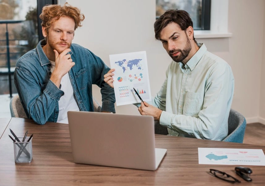 SEO professionals reviewing data