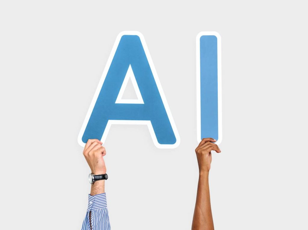 AI letters held by hands